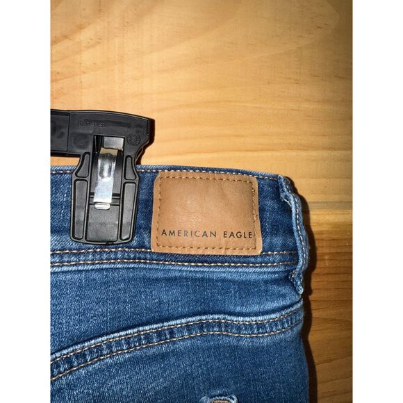 Women's AEO Next Level Stretch Mid-Wash Distressed Bootcut Jeans - Picture 4 of 6